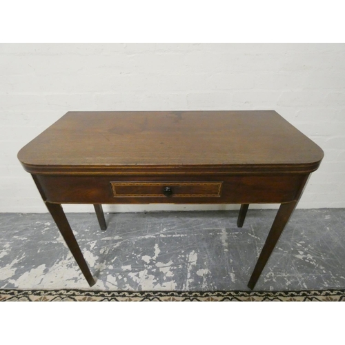 470 - Georgian inlaid mahogany tea table with fold over top above small drawer on tapered supports 75cm hi... 