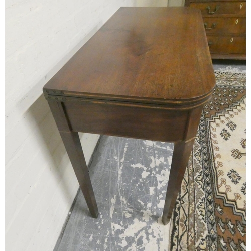 470 - Georgian inlaid mahogany tea table with fold over top above small drawer on tapered supports 75cm hi... 