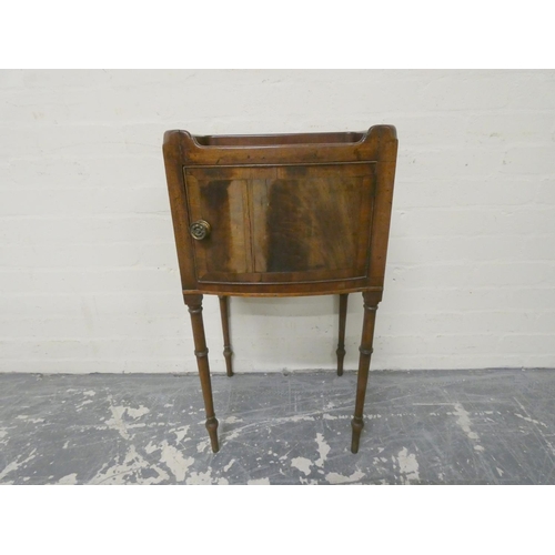 471 - Late 19th century mahogany pot cupboard with pierced tray top above single door and raised on turned... 