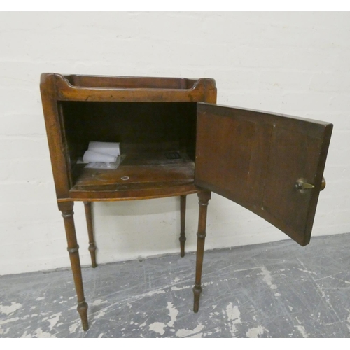 471 - Late 19th century mahogany pot cupboard with pierced tray top above single door and raised on turned... 