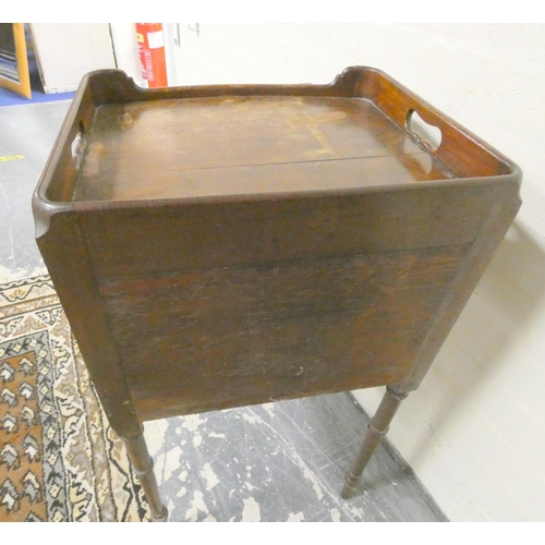 471 - Late 19th century mahogany pot cupboard with pierced tray top above single door and raised on turned... 