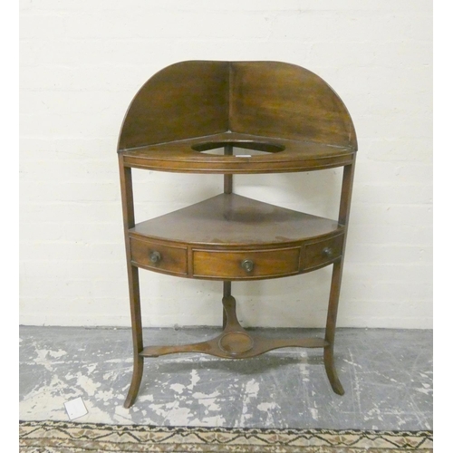 474 - Georgian mahogany bow-front corner washstand with raised half gallery top with circular aperture abo... 