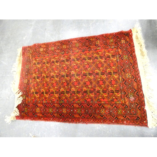 443 - Bokhara rug on red ground, 126cm x 80cm with Afghan rug, 115cm x 80cm (2)