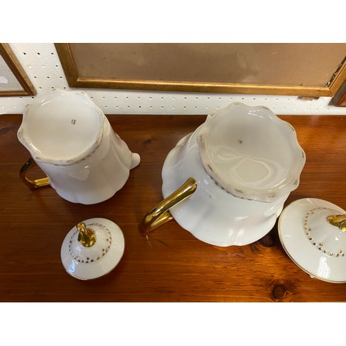 248 - Wedgewood gilt decorated tea set , gilt coffee set, prunus blossom ginger jars etc.