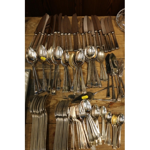 104 - Suite of silver-plated flatware.