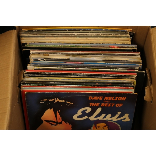 125 - Box containing LP records to include Dave Nelson, The Best of Elvis, The New Seekers, The Nolan Sist... 