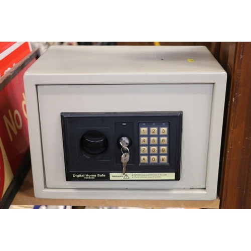 140 - Digital home safe with key.