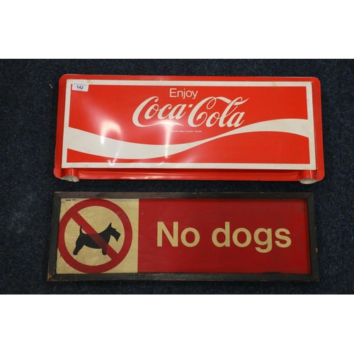 142 - Vintage 'No Dogs' sign and a plastic Coca Cola sign.