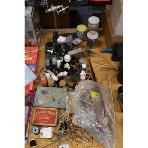 143 - Fly tying equipment to include vices, scissors, nail polishes and other solvents, etc. 