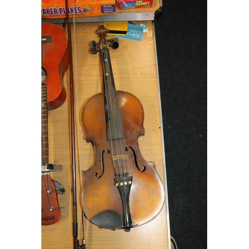 146 - Student's violin with label Tatra by Rosetti Stradivarius model, and a bow.