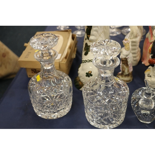 216 - Glass decanters and a glass apple paperweight.