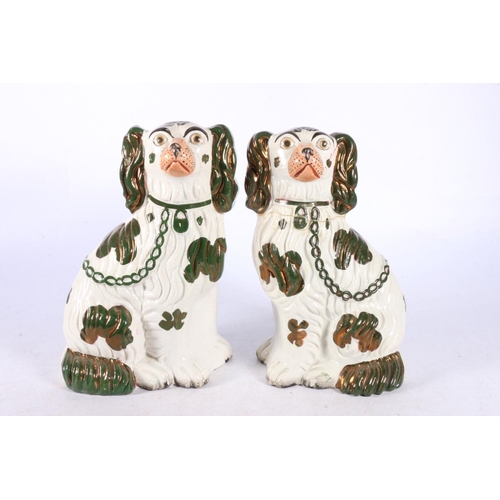 218 - Pair of green copper lustre Staffordshire flatback figurines.