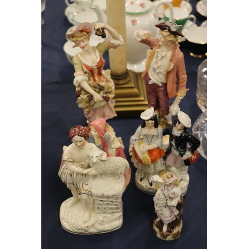 219 - Staffordshire figure of a girl with lamb, other 19th century figures and a Royal Doulton figurine.