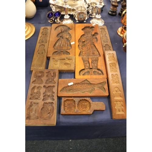 225 - Treen butter moulds, pastry and other moulds.