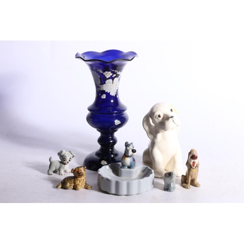 270 - Painted Bristol Blue glass vase, a Beswick puppy #454 and Wade Whimsies.