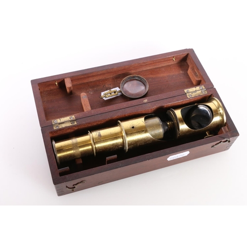 292 - Late 19th century/early 20th century travelling brass microscope in original wooden case.