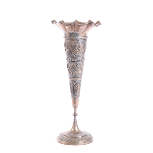 585 - Indian silver plated vase of trumpet shape with embossed Krishna decoration, H28cm