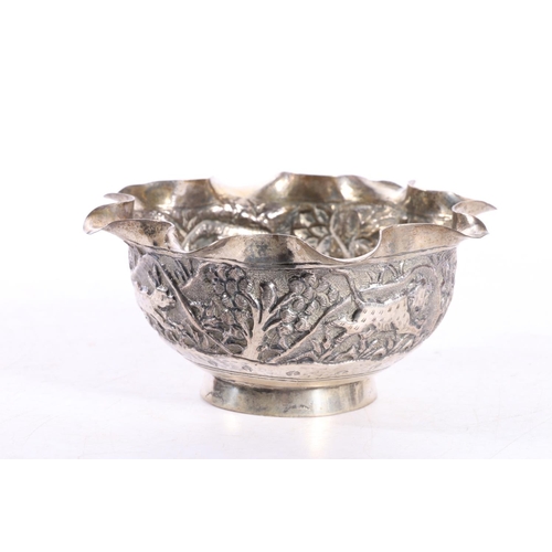 589 - Small Indian white metal bowl with an embossed jungle animal scene, H6cm