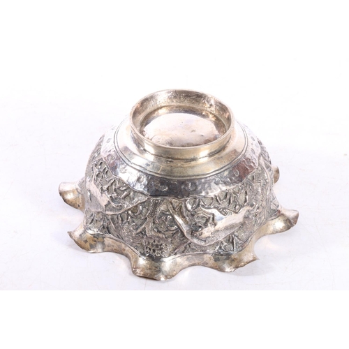 589 - Small Indian white metal bowl with an embossed jungle animal scene, H6cm