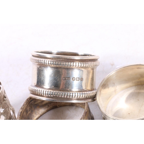 590 - Scottish style silver napkin ring set with central citrine coloured stone within pierced thistle dec... 