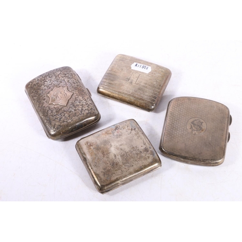 592 - Four early to mid-20th century hallmarked silver cigarette cases, various dates and makers, gross 35... 