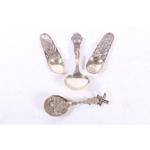 596 - Norwegian .830 standard silver caddy spoon, makers indistinct, a Dutch white metal souvenir spoon an... 