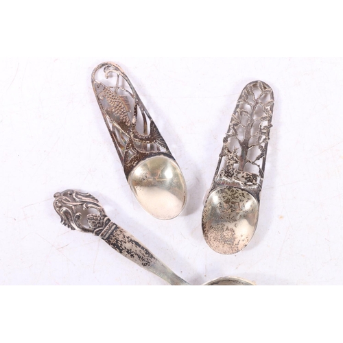 596 - Norwegian .830 standard silver caddy spoon, makers indistinct, a Dutch white metal souvenir spoon an... 