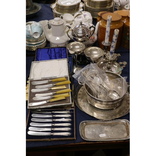 64 - Silver-plated ware to include a pair of chamber sticks, two Links of London goblets, a pierced shall... 