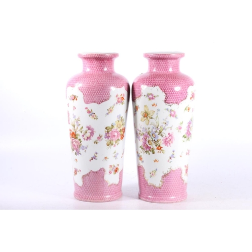 65 - Pair of Austrian transfer printed and floral decorated vases, 32cm high.