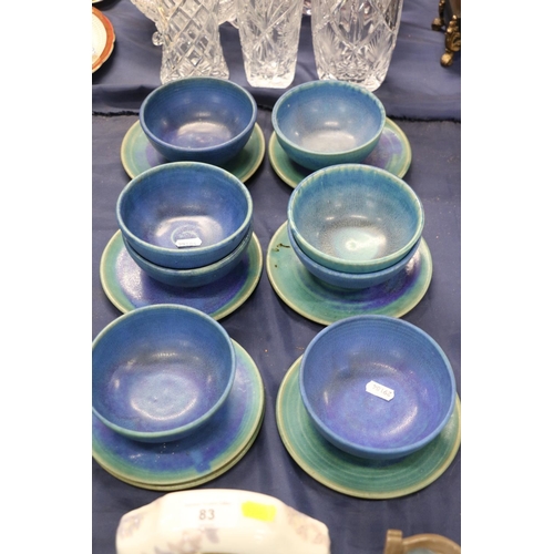 84 - Eight Studio Pottery drip-glaze bowls and six matching saucers.