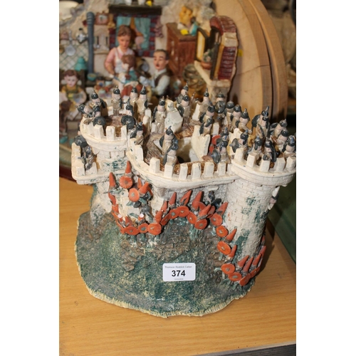 374 - Pottery model of a castle and a Capo Di Monte style figure group, (2).