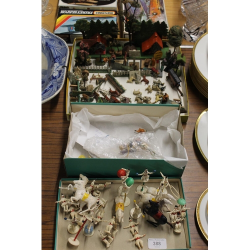 388 - Miniature toys to include circus performers, a woodland scene, etc.