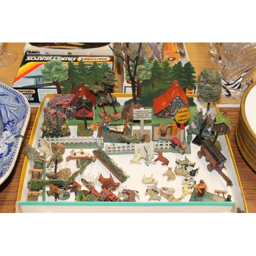 388 - Miniature toys to include circus performers, a woodland scene, etc.