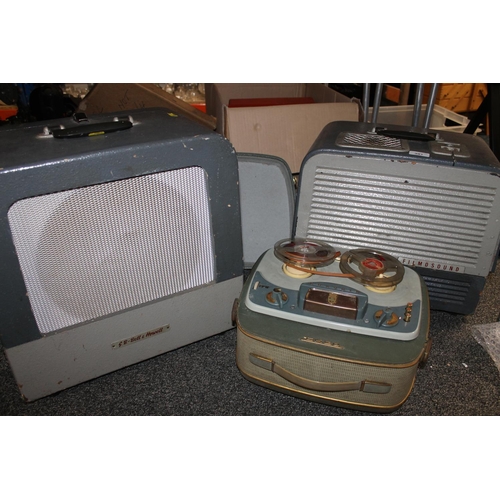 391 - Bell & Howell reel-to-reel and two cased projectors.