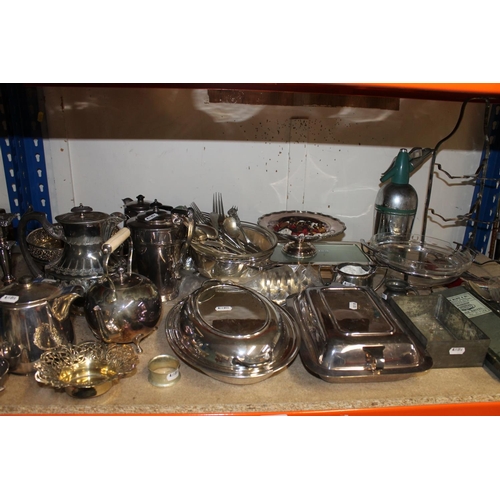 396 - Silver-plate to include a tureen and covers, flatware, candlesticks, etc.