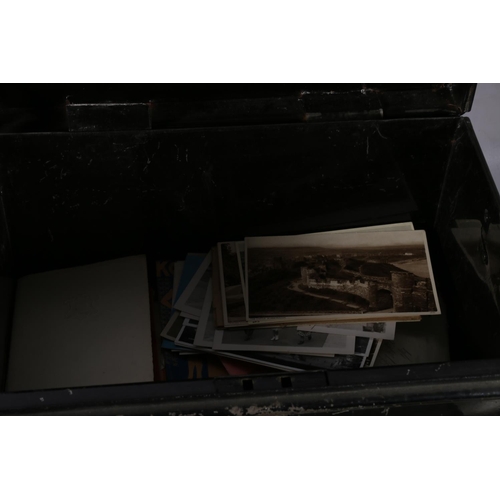 473 - Black metal deed box containing a collection of ephemera to include postcards (HMS Shropshire, King ... 