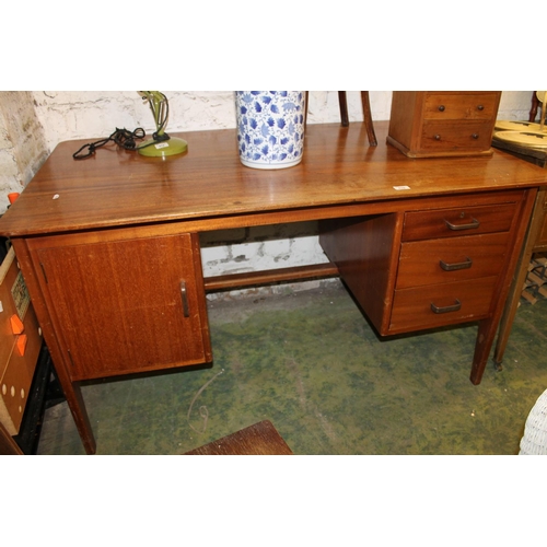 615 - Mid-20th century Gordon Russell teak twin pedestal desk. Provenance: reputed to have previously belo... 