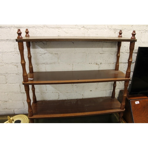 619 - Mahogany three-tier display shelves.