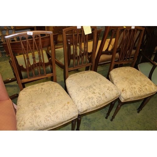 655 - Three Edwardian mahogany dining chairs with satinwood inlay.