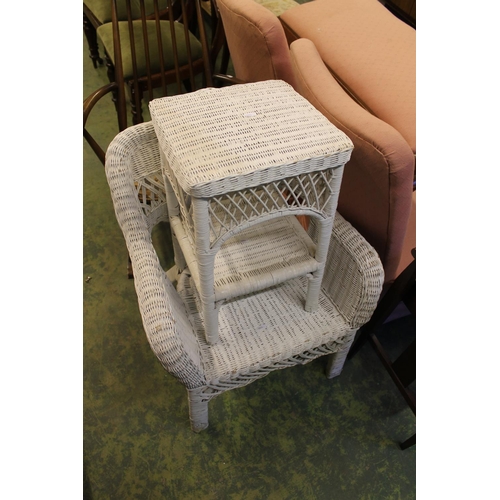 662 - White painted wicker conservatory chair with a small side table.