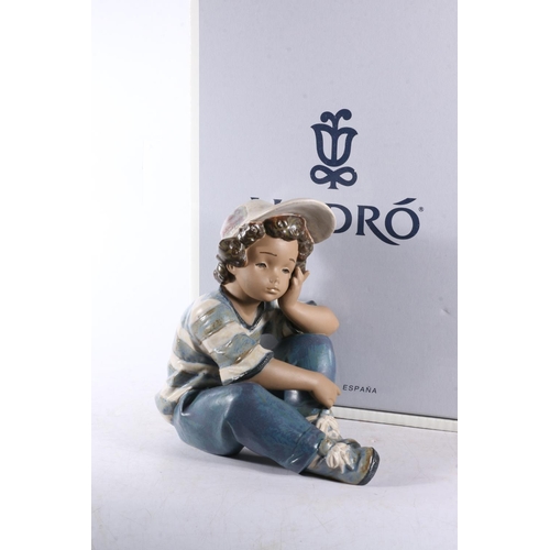 159 - Lladro porcelain figurine 12209 Long Day (Nino Pensativo), 19.5cm tall, boxed.