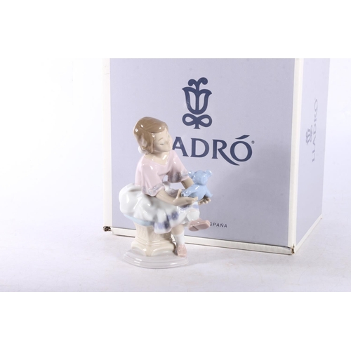 161 - Lladro porcelain figurine 07620 Best Friend (Columpiando Al Osito), 17cm tall, boxed.