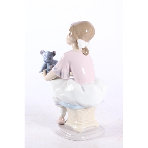 161 - Lladro porcelain figurine 07620 Best Friend (Columpiando Al Osito), 17cm tall, boxed.