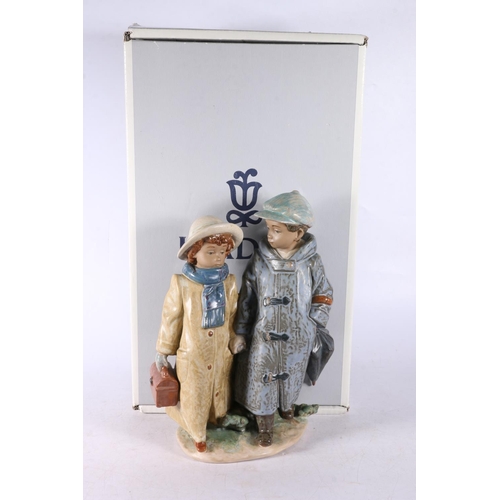 165 - Lladro porcelain figurine 12242 Off to School (Camino Del Colegio), 27.5cm tall, boxed.