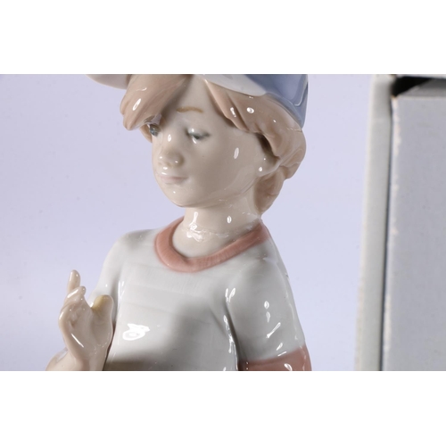 177 - Three Lladro porcelain figurines to include 7610 Can I Play (Dispueato A Jugar), 07611 Summer Stroll... 