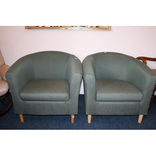 666 - Pair of late 20th century green upholstered tub chairs.