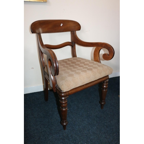 667 - Late Victorian armchair with scrolled arms.