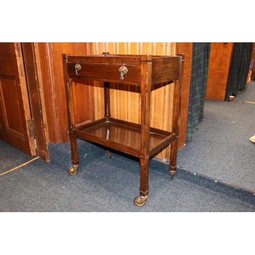 671 - Mid-20th century oak tea trolley.