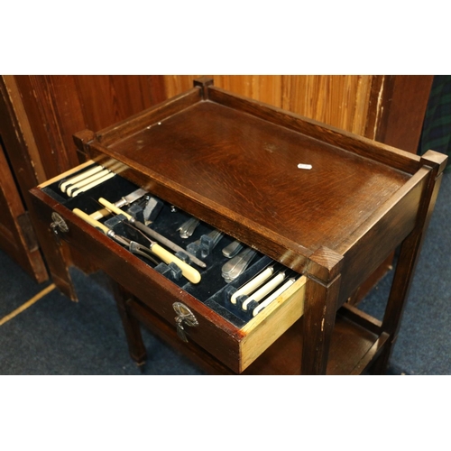 671 - Mid-20th century oak tea trolley.