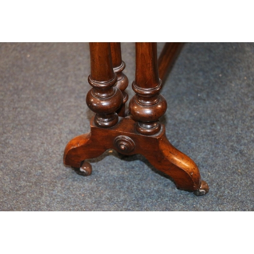 680 - Walnut drop-leaf Sutherland table.